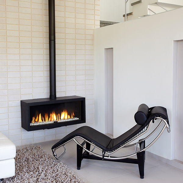small modern fireplace with stovepipe