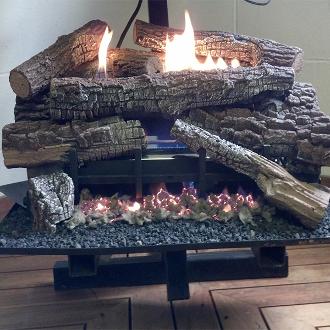 stack of fake logs on hearth